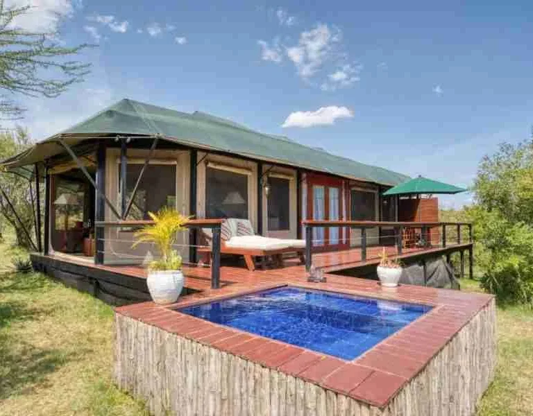 Olare Mara Kempinski Masai Mara National Reserve Adeli Kenya Safaris best Africa sustainable safari tour company in Kenya