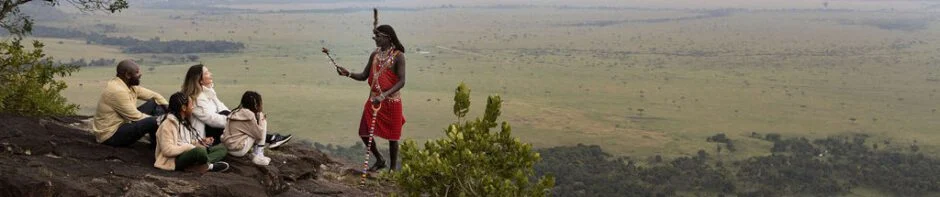 Angama Mara Family on the Out of Africa Kopje. Book with Adeli Kenya Safaris