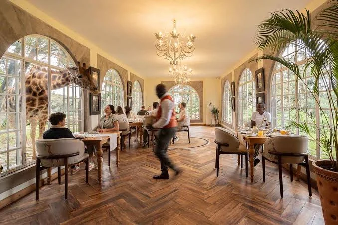 Giraffe Manor ultra luxury hotel in Nairobi Kenya Book Kenya safari tours for Influencers with Adeli Kenya Safaris