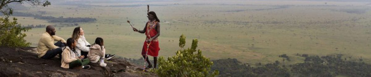 Angama Mara Family on the Out of Africa Kopje. Book with Adeli Kenya Safaris