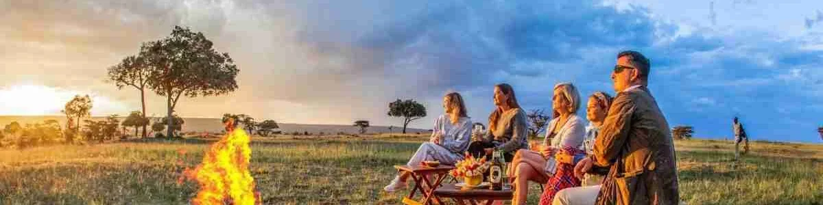 Karen Blixen Masai Mara Luxury camp sundowner Adeli Kenya Safaris best Africa sustainable safari tour company in Kenya