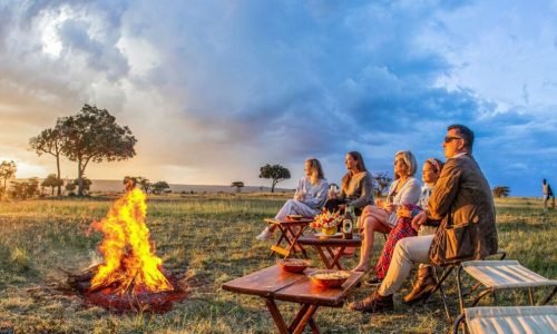 Karen Blixen Masai Mara Luxury camp sundowner - Savannah Journeys - best Africa safari tour company and travel agency in Kenya